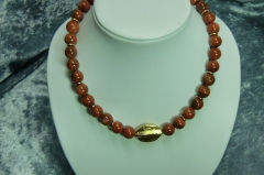 Material: Goldfluss mit Metall